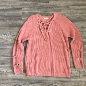 Sweater with lace up details